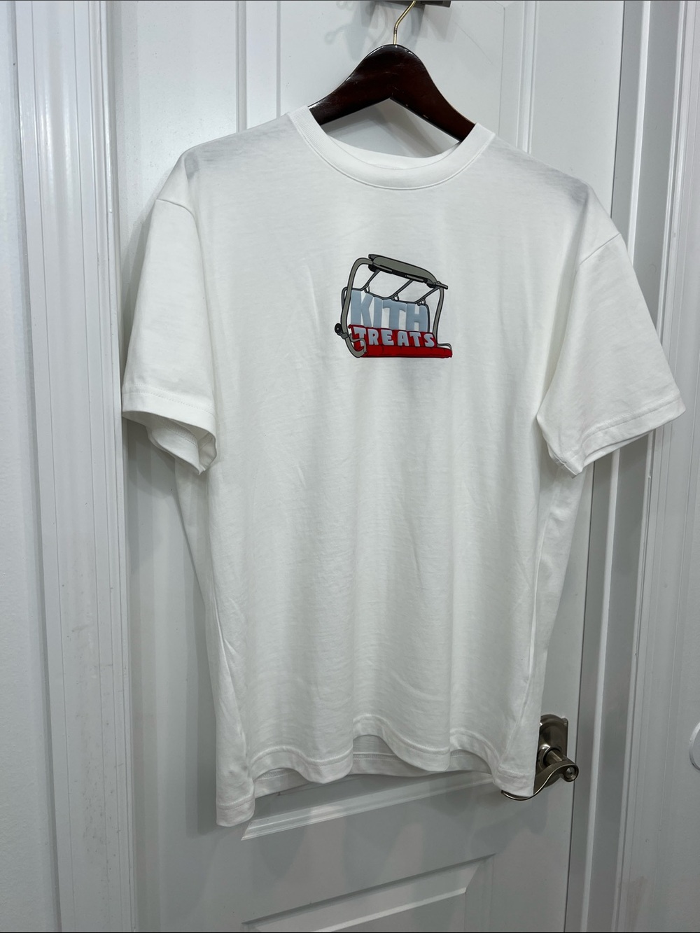 Kith White Short Sleeve Tee with Blue and Red 'Treats' Logo